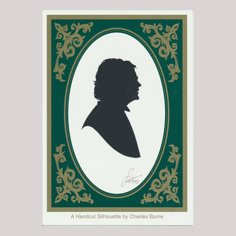 
        Front of silhouette in frame, with woman looking right, wearing glasses.